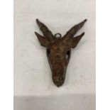 Unusual bronzed metal antelope head mask.