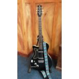Danelectro left-handed six string electric guitar finished in gloss black