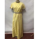 1970's clothing including gold and yellow beaded brocade hostess dress, cream chiffon hostess dress,