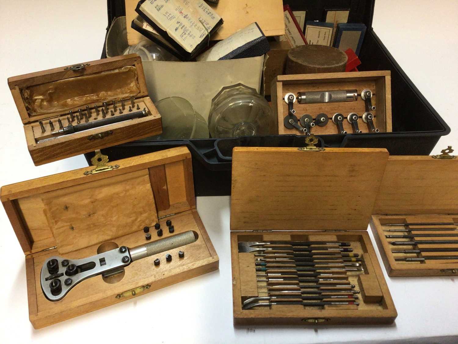 Four boxes of watchmaking equipment, including lathes, watch faces, etc - Image 9 of 14