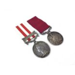 Victorian medal pair comprising Indian Mutiny medal with one clasp- Delhi named to Chas. Smith 1st B