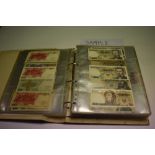 European - An album containing mixed banknotes to include issues from Belgium, Poland, Portugal, Yug