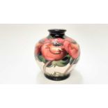 Moorcroft pottery vase decorated in the Meo Voto pattern by Rachel Bishop, dated 2013, 11cm high, bo