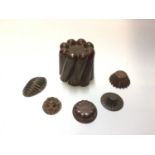 Victorian copper jelly mould, together with five copper sweet moulds, including one from the Hotel M