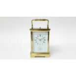 Brass carriage clock with alarm and repeat