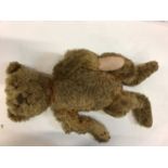 Early German Teddy Bear. Cinnamon coloured curly mohair ( true colour evident in joints and back of