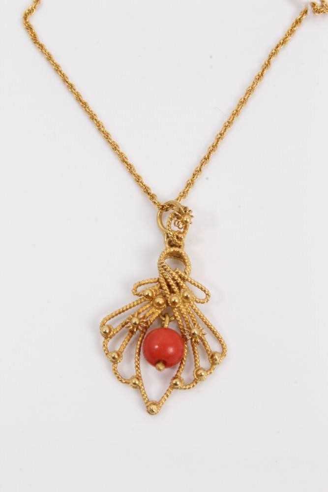 Continental 18ct gold filigree coral bead pendant on chain