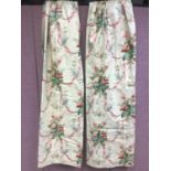 Two pairs of floral glazed cotton curtains with pinch pleat headings and lined. 130 cm (at hem) x 1