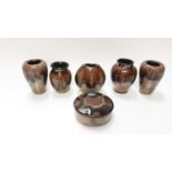 Five small Poole pottery brown and bronze glazed vases, together with a lidded pot (6)