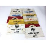 Collection of seventeen Post War replica Nazi arm bands (17)