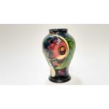 Moorcroft pottery vase decorated in the Queen's Choice pattern, dated 2000, 16cm high, boxed