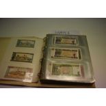 Africa - An album containing mixed banknotes to include issues from Guinea, Central Africa, Zambia,