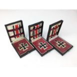 Group of three Post War copies of Nazi Iron Cross Second Class, with boxes of issue. (3)