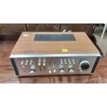 Rotel RA-611 solid state stereo amplifier, together with a tuner and a receiver (3)