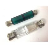 Victorian Bristol green glass double ended scent bottle with white metal tops, together with a clear