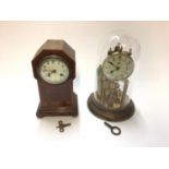 Edwardian inlaid mahogany mantel clock, and a Schatz clock under a glass dome (2)