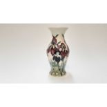 Moorcroft pottery vase decorated in the Duet pattern