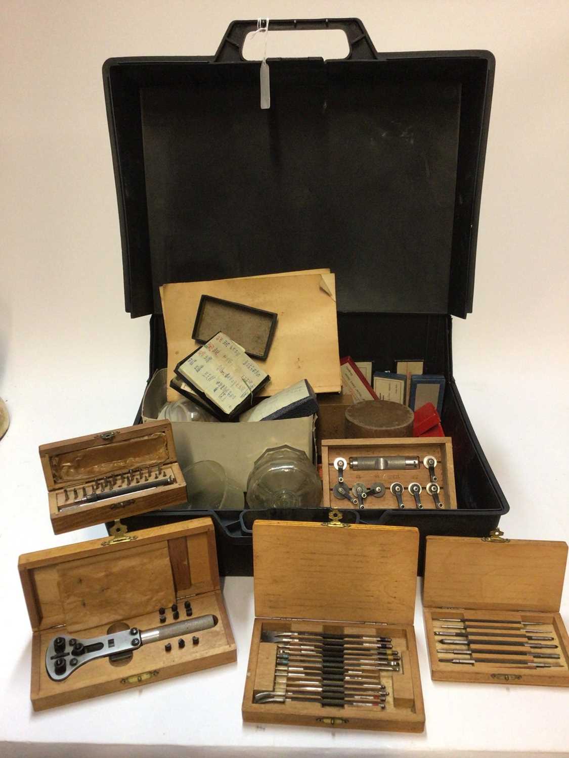 Four boxes of watchmaking equipment, including lathes, watch faces, etc - Image 8 of 14