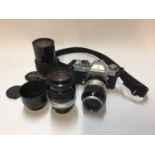 Nikkormat EL camera and lenses