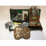 Box of fly fishing related tools and items