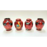 Eight various small Poole pottery vases and ginger jars with covers with abstract decoration