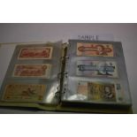 World - An album containing mixed banknotes to include issues from New Zealand, Canada, East Caribbe
