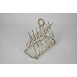 Impressive early 20th century novelty silver plated six division toast rack in the form of crossed g