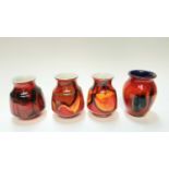 Eight various small Poole pottery vases with abstract patterns