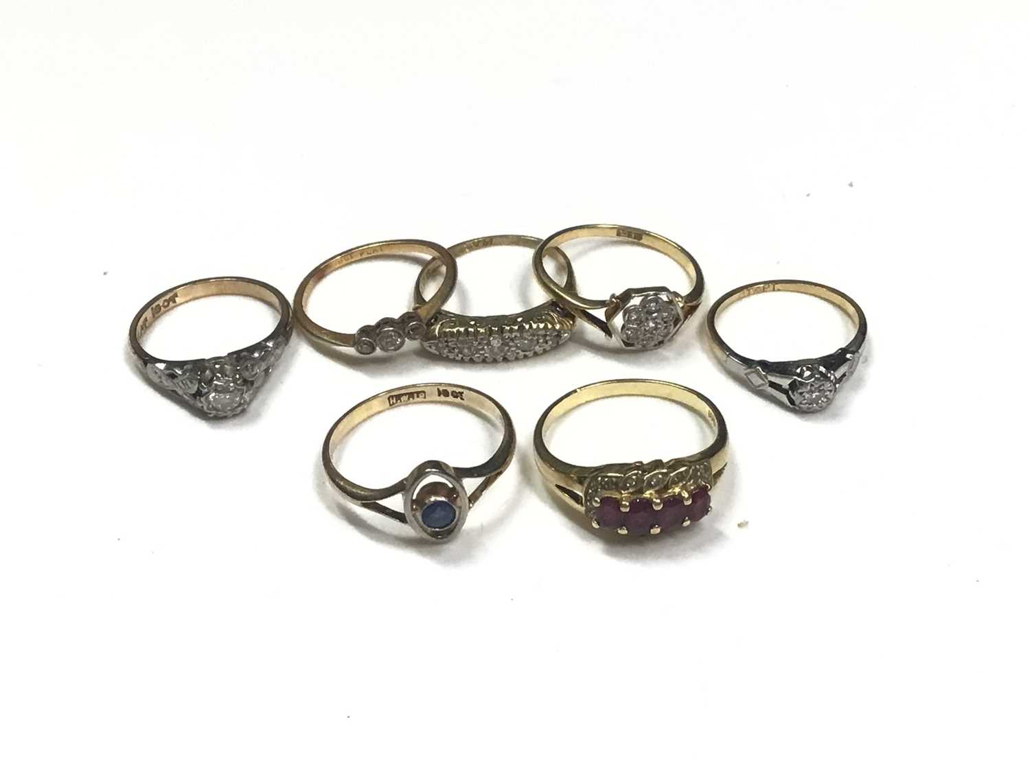 Five 18ct gold diamond set rings and two 18ct gold gem set rings (7)