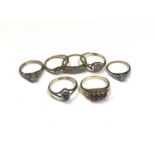 Five 18ct gold diamond set rings and two 18ct gold gem set rings (7)