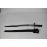 British 1856 Pattern Enfield sabre bayonet with yatagang blade and steel mounted leather scabbard