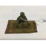 Cold painted bronze figure of an Arab man sitting on a rug smoking, probably Austrian