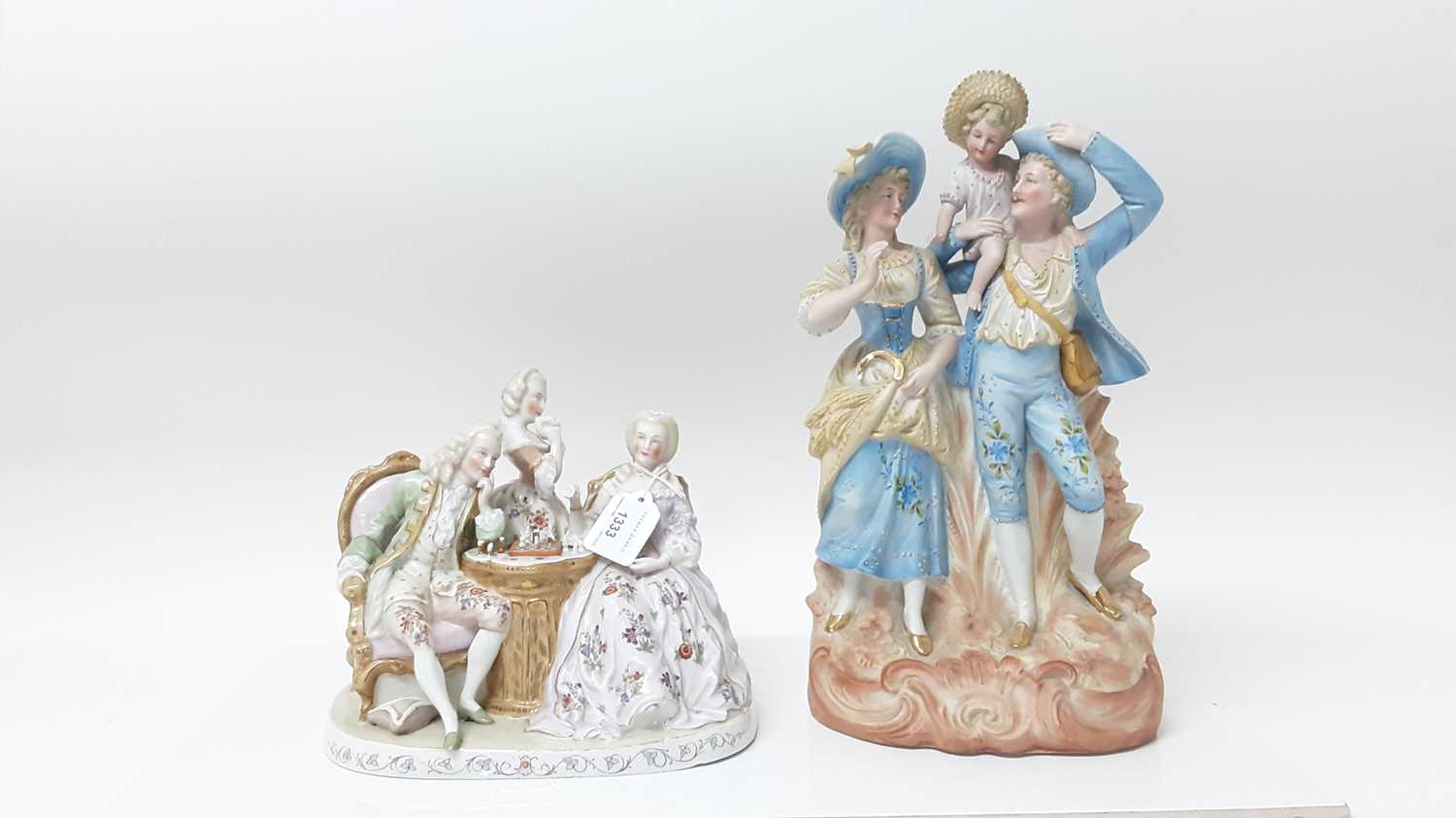 Group of eight continental late 19th century and later figures including chess players and a pair of