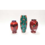 Three Poole pottery vases to include one with abstract decoration, signed N Massarella, 29.5cm high