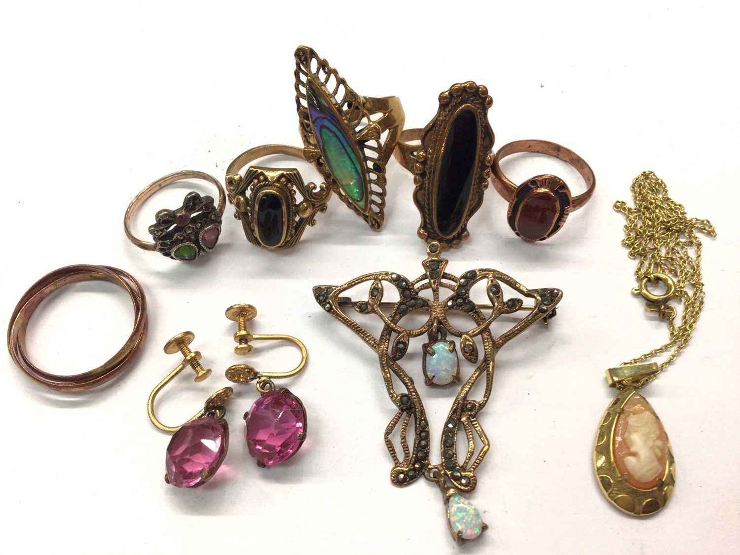 Group brass dress rings, pair pink stone screw back earrings, Art Nouveau style brooch and cameo nec