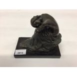 Contemporary bronzed metal figure of a sleeping woman on a black marble base, marked Milo to base, 1