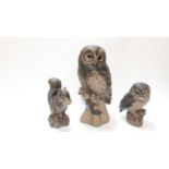 Two Poole Barbara Linley Adams stoneware Owls, 33cm high and 18cm high, together with a Squirrel, 19