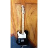 Fender Telecaster left-handed electric six string,made in Mexico, serial number MX14560144.