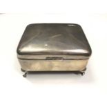 Silver rectangular jewellery box on four cabriole legs (Chester 1919)