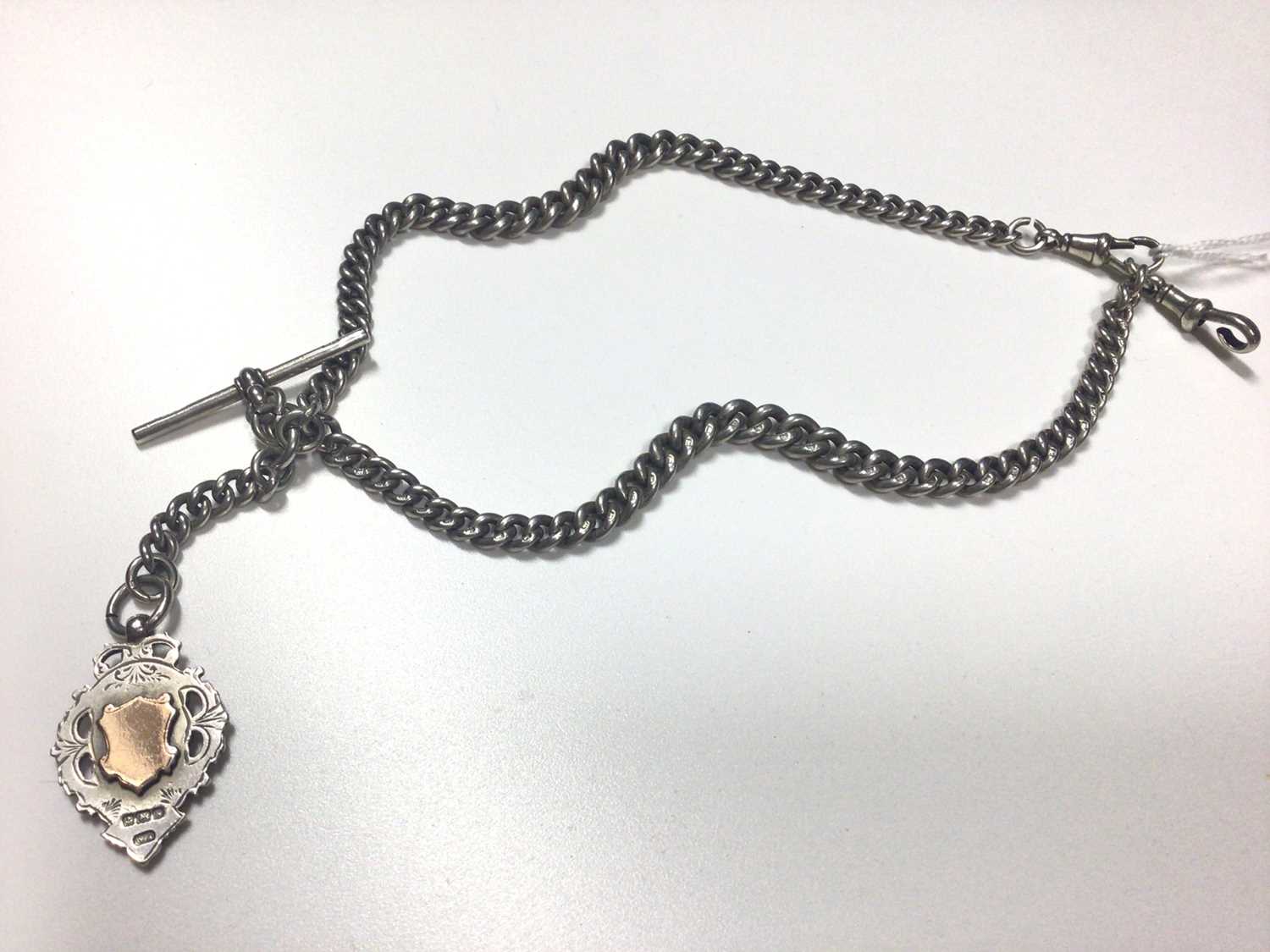 Edwardian silver curb link watch chain/necklace with a silver fob