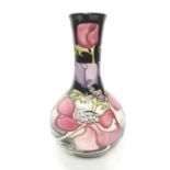 Moorcroft pottery vase with floral decoration by Emma Bossons, dated 2007, 23.5cm high