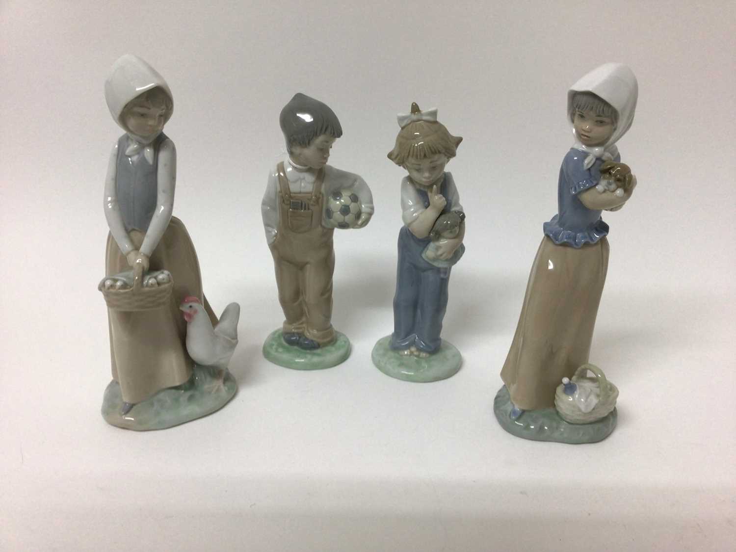 Lladro porcelain figure - girl with lamb, together with six Nao figures another similar figure and - Image 2 of 3