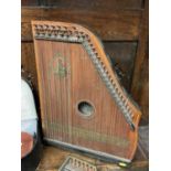 Students violin, two zithers, tambourine and other instruments