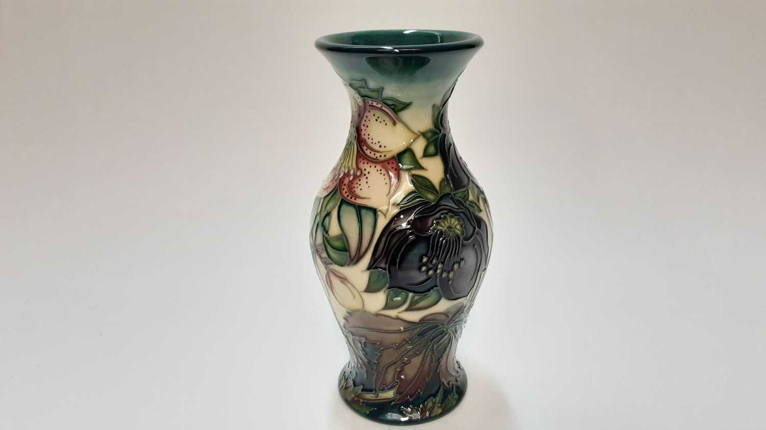 Moorcroft pottery trial vase decorated in the Hellebore pattern by Nicola Slaney, painted by Sue Bar