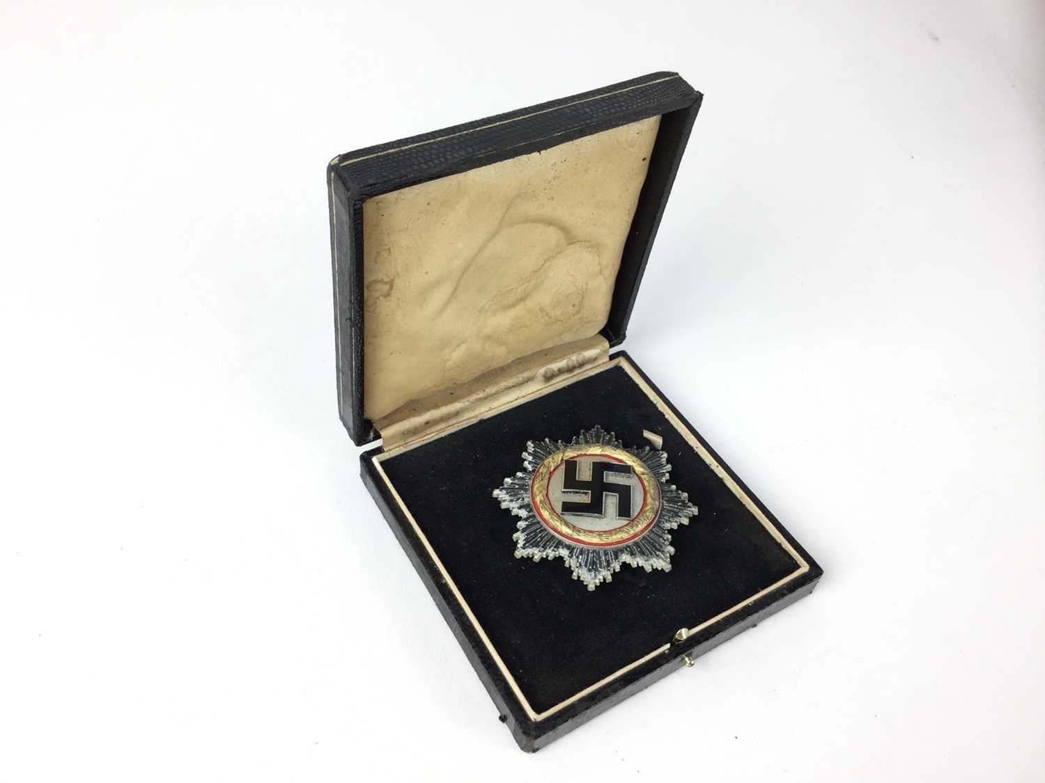 Good Post War copy of a Nazi German Cross in gold, the pin stamped with a 1, in case.