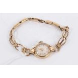 9ct gold cased ladies vintage wristwatch on 9ct gold bracelet