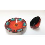 Poole pottery dish with abstract decoration together with a candle holder