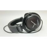 Pair of TYGR 300 R over ear headphones in case