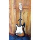 Squier Strat by Fender left-handed electric six string guitar, 20th Anniversary Edition