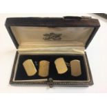 Pair of 1930s 9ct gold cufflinks with engine turned decoration